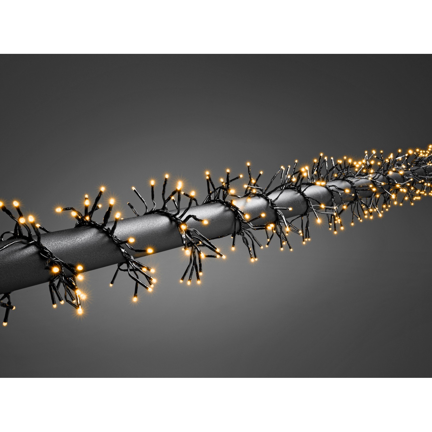 Konstsmide Mikro LED světelný řetěz v podobě svazků 576 jantarových LED pro vnit