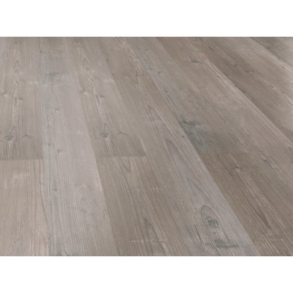 Laminátová podlaha Comfort Borovice Vintage, tloušťka 7 mm, v detailu. Vzhled dřeva s citelnou strukturou.