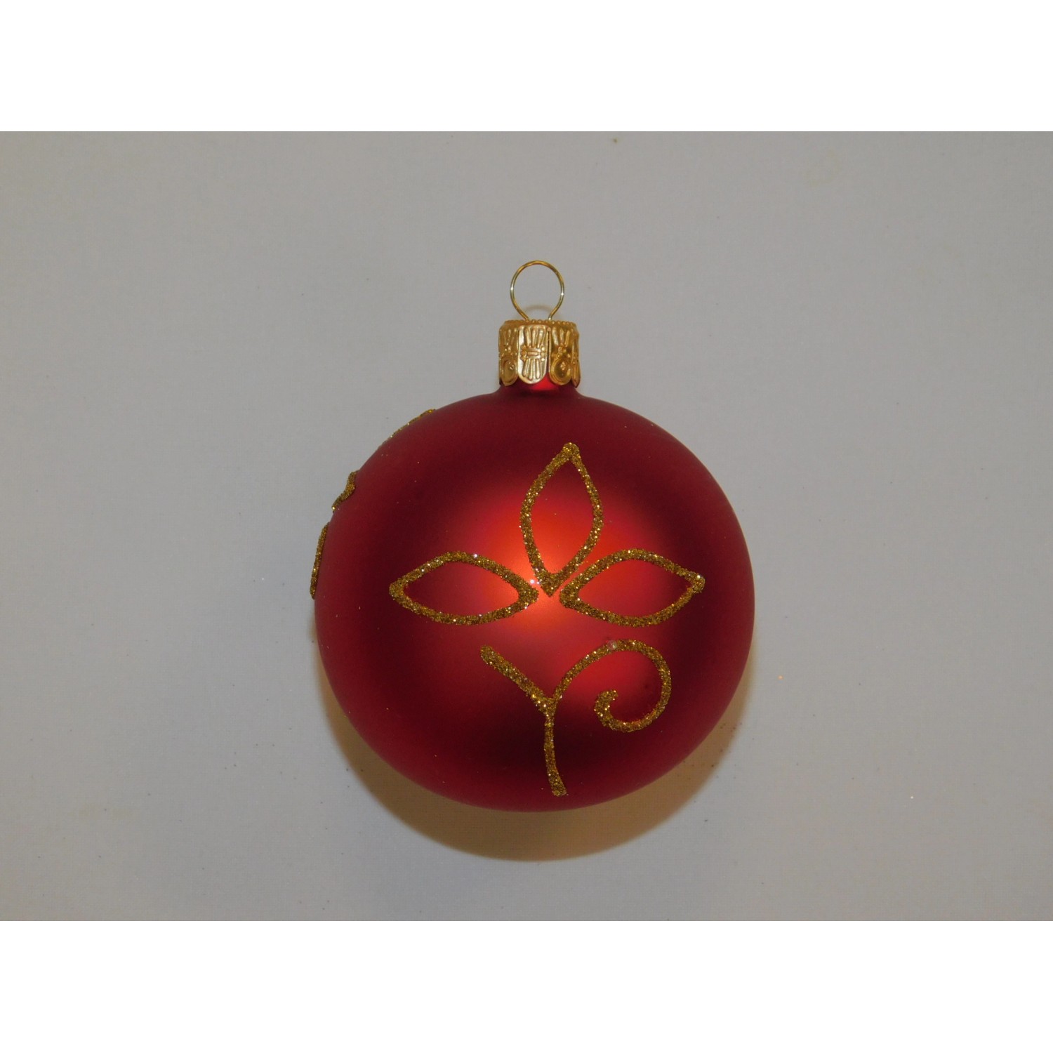 ONREX Vánoční ozdoba skleněná koule červená lístky pr. 7 cm