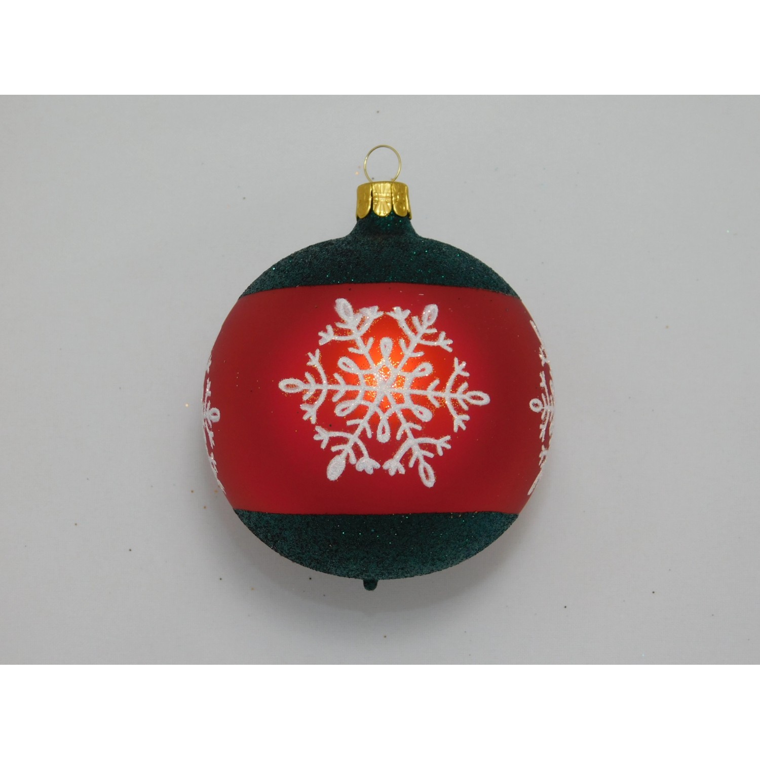 Ornex Skleněná vánoční ozdoba červená s bílými vločkami pr. 8 cm